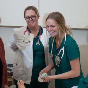 Nursing students smiling together